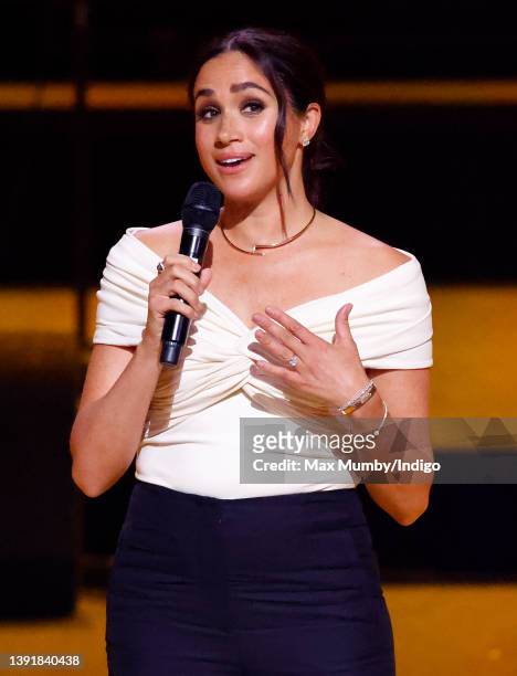 Meghan, Duchess of Sussex makes a speech on stage during the Opening Ceremony of the Invictus Games 2020 at Zuiderpark on April 16, 2022 in The...