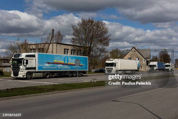 Truck wait in line to enter Kaliningrad on April 16, 2022 in Panemune, Lithuania. Russia's Kaliningrad exclave, on the shore of the Baltic Sea, is...