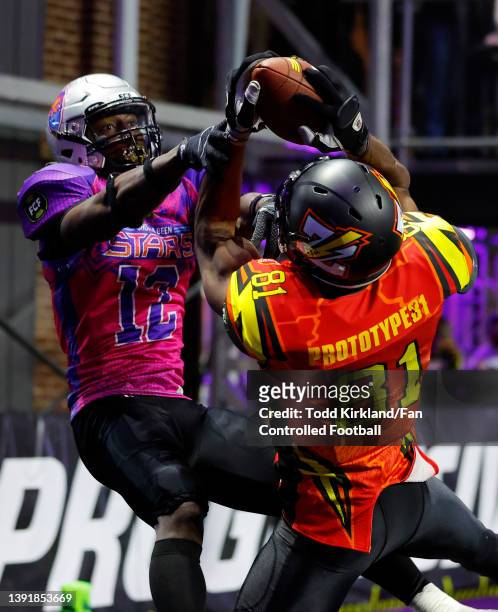Terrell Owens of the Zappers catches a touchdown against Julian Charles of the Shoulda Been Stars in the second half of the Fan Controlled Football...