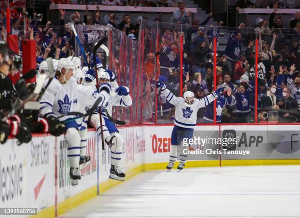 Mark Giordano of the Toronto Maple Leafs celebrates his overtime game winning goal against the Ottawa Senators at Canadian Tire Centre on April 16,...