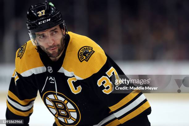 Patrice Bergeron of the Boston Bruins looks on during the first period against the Ottawa Senators at TD Garden on April 14, 2022 in Boston,...