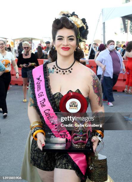 The newly crowned 2022 Viva Las Vegas Queen of the Carshow Claudi Rox poses during the car show at the 25th anniversary of the Viva Las Vegas...