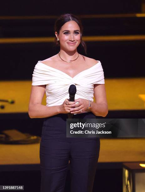 Meghan, Duchess of Sussex speaks on stage during the Invictus Games The Hague 2020 Opening Ceremony at Zuiderpark on April 16, 2022 in The Hague,...