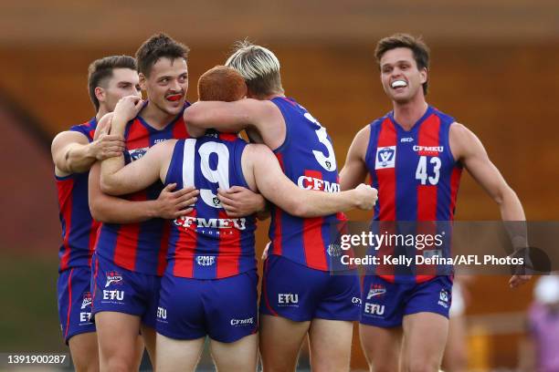 Anthony Anastasio of Port Melbourne celebrates a goal with team mates during the round four VFL match between Port Melbourne and the Essendon Bombers...