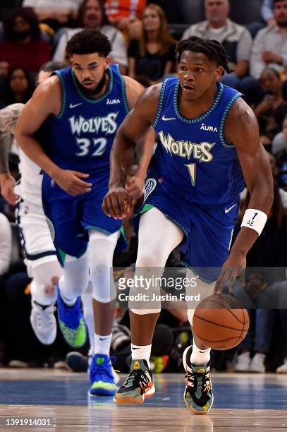 Anthony Edwards of the Minnesota Timberwolves brings the ball up court during Game One of the Western Conference First Round against the Memphis...