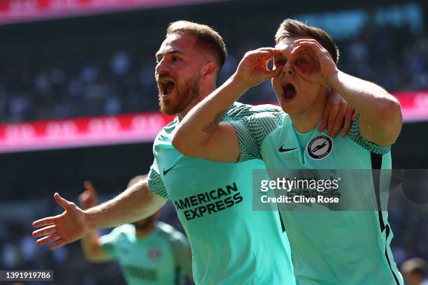 Leandro Trossard of Brighton & Hove Albion celebrates with team mate Alexis Mac Allister after scoring their sides first goal during the Premier...