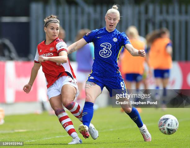 Steph Catley of Arsenal is challenged by Bethany England of Chelsea during the Vitality Women's FA Cup Semi Final match between Arsenal Women and...