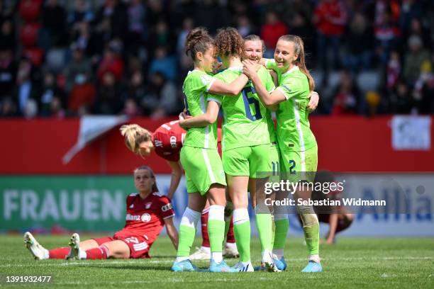 Alexandra Popp, Felicitas Rauch, Lynn Wilms and Dominique Janssen of VfL Wolfsburg celebrate after their sides victory during the Women's DFB Cup...