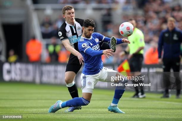 Matt Targett of Newcastle United challenges Ayoze Perez of Leicester City during the Premier League match between Newcastle United and Leicester City...