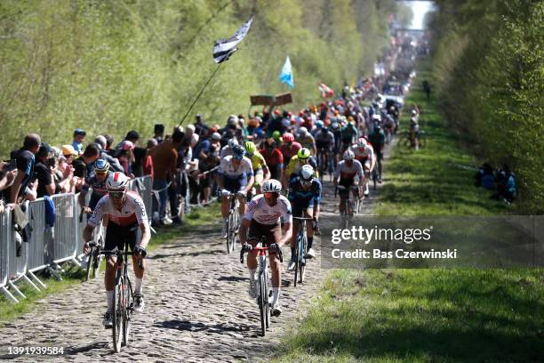 Kenneth Vanbilsen of Belgium and Team Cofidis and Antoine Raugel of France and AG2R Citröen Team compete passing through La Trouée d'Arenberg...