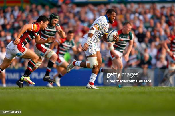 Alivereti Raka of ASM Clermont Auvergne runs with the ball during the Heineken Champions Cup Round of 16 Leg Two match between Leicester Tigers and...