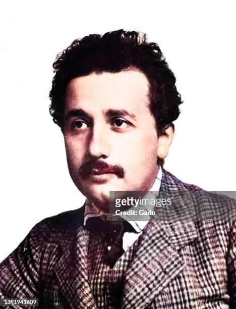 Colorized photograph of theoretical physicist Albert Einstein, wearing a check-print suit and vest and looking calmly into the distance, Berne,...
