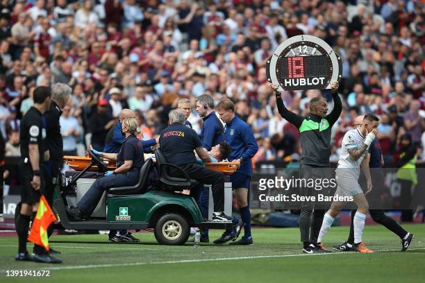 Ashley Westwood of Burnley is taken off on a stretcher during the Premier League match between West Ham United and Burnley at London Stadium on April...