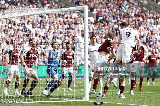 Wout Weghorst of Burnley scores their sides first goal during the Premier League match between West Ham United and Burnley at London Stadium on April...