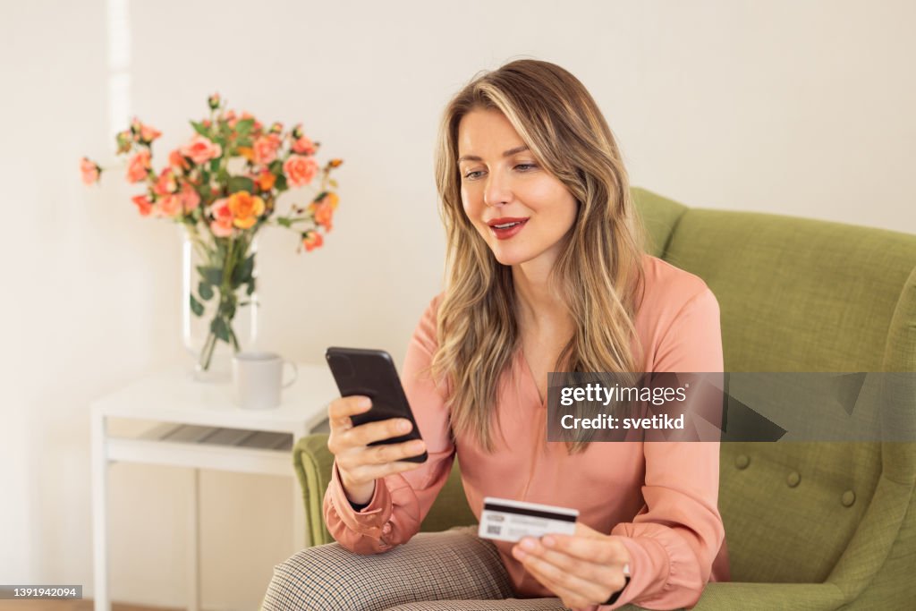 Using Home Phone Woman At Home Using Smart Phone High-Res Stock Photo - Getty Images