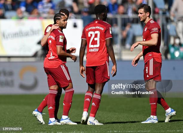 Serge Gnabry of FC Bayern Muenchen celebrates with team mates after scoring their sides second goal during the Bundesliga match between DSC Arminia...