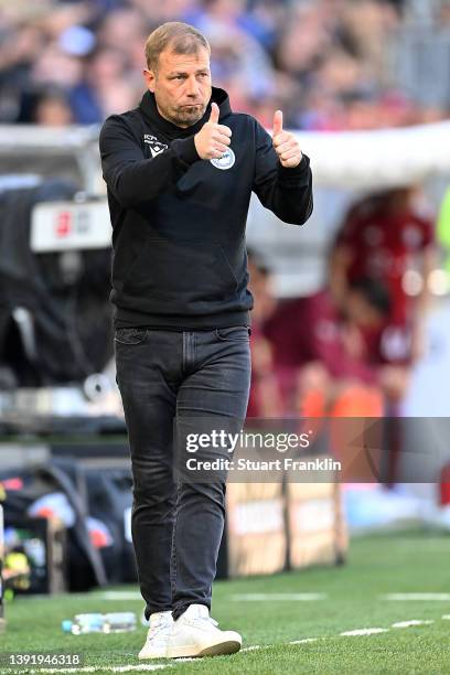 Frank Kramer, Head Coach of Arminia Bielefeld reacts during the Bundesliga match between DSC Arminia Bielefeld and FC Bayern München at Schueco Arena...