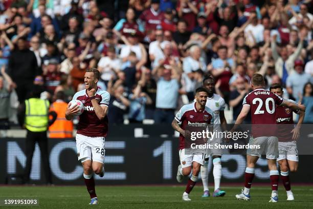 Tomas Soucek of West Ham United celebrates after scoring their sides first goal during the Premier League match between West Ham United and Burnley...