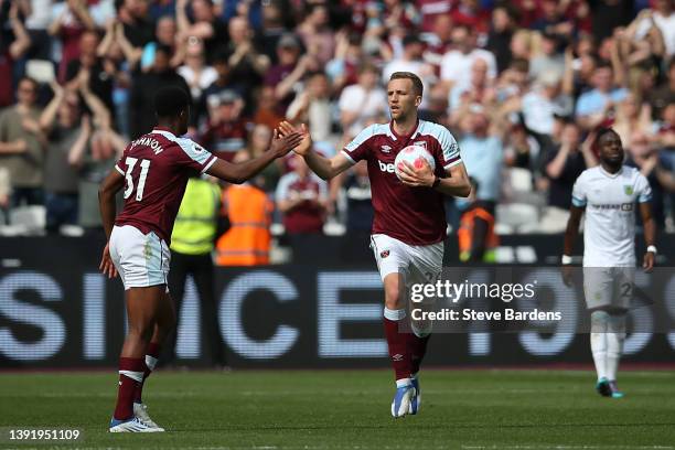 Tomas Soucek of West Ham United celebrates with team mate Ben Johnson after scoring their sides first goal during the Premier League match between...