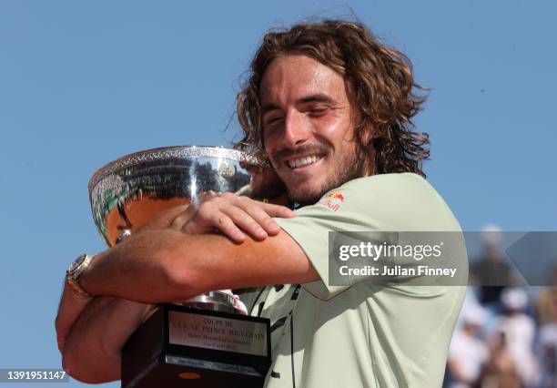 Stefanos Tsitsipas of Greece celebrates his victory hugging the trophy after his match with Alejandro Davidovich Fokina of Spain in the final during...