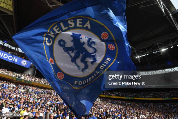 Chelsea fans wave flags prior to The FA Cup Semi-Final match between Chelsea and Crystal Palace at Wembley Stadium on April 17, 2022 in London,...