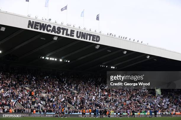 Newcastle United fans applaud their side off the pitch after their sides victory during the Premier League match between Newcastle United and...