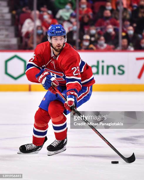 Ryan Poehling of the Montreal Canadiens skates the puck against the Washington Capitals during the second period at Centre Bell on April 16, 2022 in...