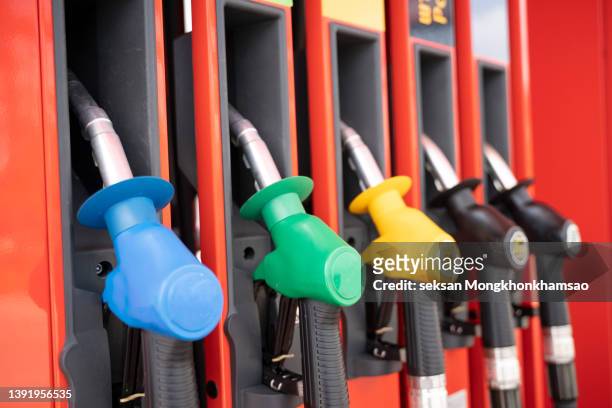 close-up of multi colored fuel pumps - escarpin à talon photos et images de collection