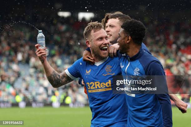 Scott Arfield of Rangers celebrates with teammates after their sides victory during the Scottish Cup Semi Final match between Celtic FC and Rangers...
