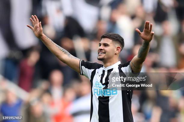 Bruno Guimaraes of Newcastle United celebrates with the fans after their sides victory during the Premier League match between Newcastle United and...