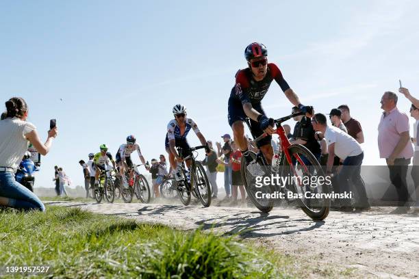 Yves Lampaert of Belgium and Team Quick-Step - Alpha Vinyl and Dylan Van Baarle of Netherlands and Team INEOS Grenadiers compete passing through a...