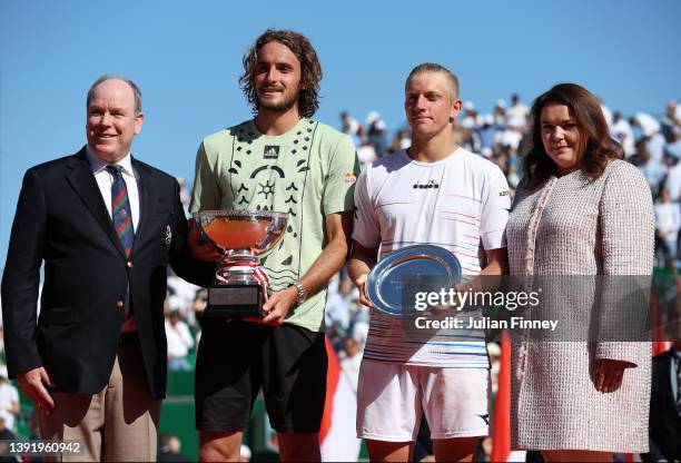Stefanos Tsitsipas of Greece with the winners trophy after his match with Alejandro Davidovich Fokina of Spain in the final alongside Albert II,...