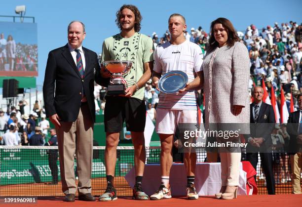 Stefanos Tsitsipas of Greece with the winners trophy after his match with Alejandro Davidovich Fokina of Spain in the final alongside Albert II,...
