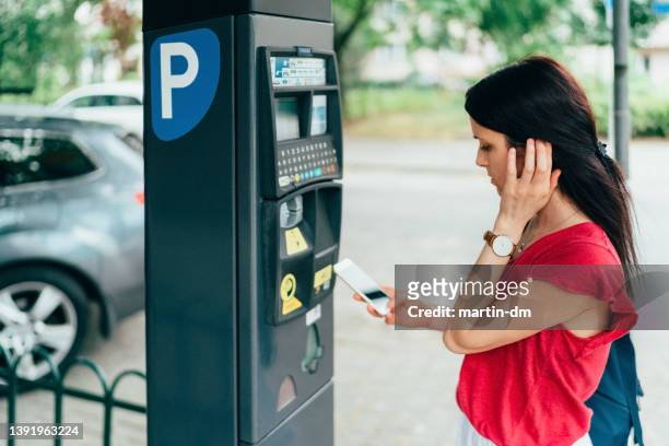 contactless payment for parking place in the city - car nfc stock pictures, royalty-free photos & images
