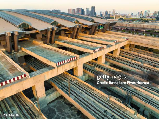 Aerial Drone View Of Train Rail Tracks Electricity Cables And Station Platform At Bang Sue Central Station The New Railway Hub Transportation Building Under Construction In Bangkok Thailand High-Res Stock Photo