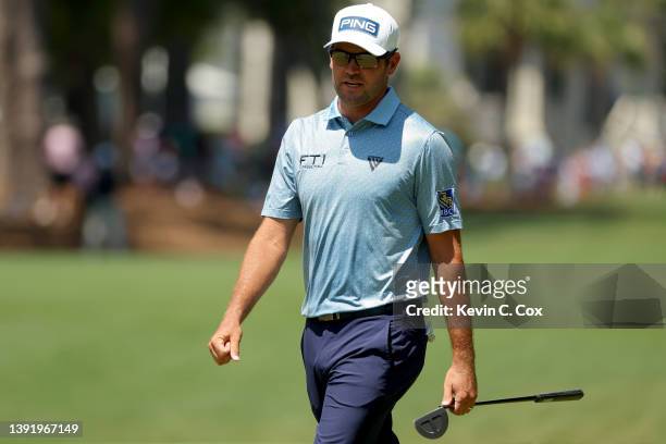 Corey Conners of Canada walks across the first green during the final round of the RBC Heritage at Harbor Town Golf Links on April 17, 2022 in Hilton...