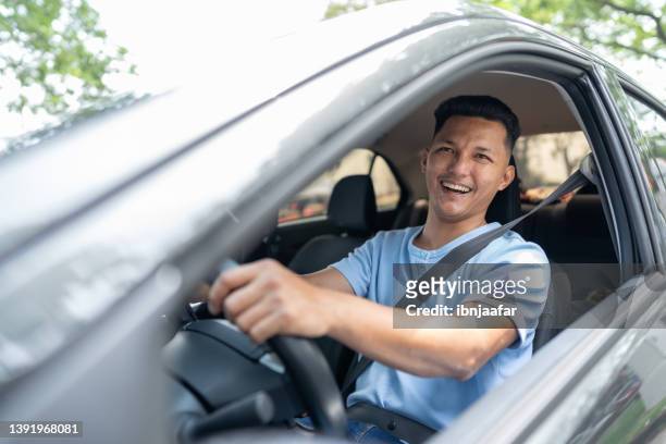 asian man in the car - loyalty card bildbanksfoton och bilder