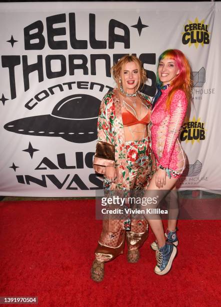 Bella Thorne and Dani Thorne attend Bella Thorne Hosts "Alien Invasion" Themed Coachella After Party On April 15, 2022 In Coachella Valley,...