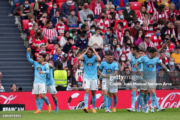 Fran Beltran of Celta Vigo celebrates with team mates after scoring their sides second goal during the LaLiga Santander match between Athletic Club...