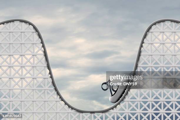 roller coaster of interest rates and inflation - rente stockfoto's en -beelden