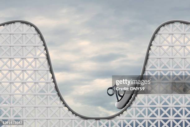 roller coaster of interest rates and inflation - interest stockfoto's en -beelden