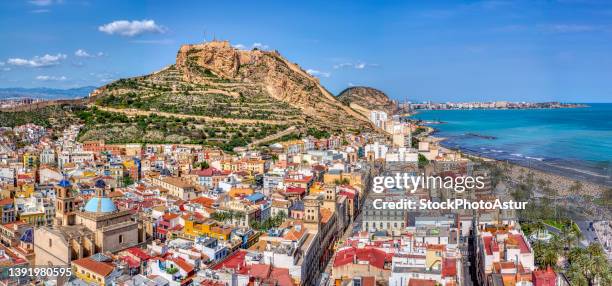 alicante with the cathedral and the castle of santa barbara, spain. - alicante spain stock pictures, royalty-free photos & images