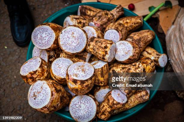 the central market in arusha, tanzania - taro stock pictures, royalty-free photos & images