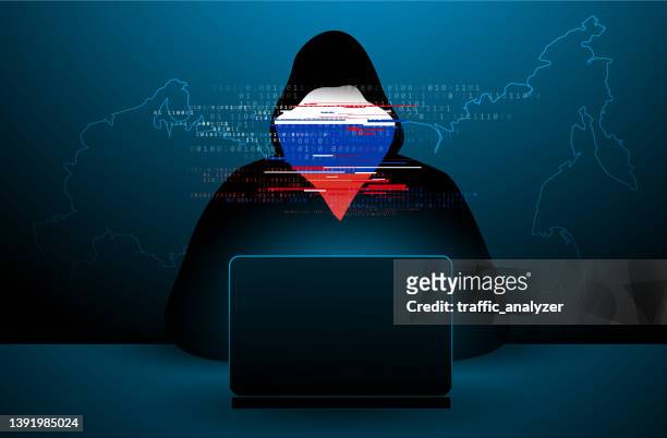 russian hacker in a hoodie - computer crime stock illustrations