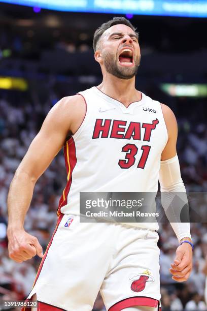 Max Strus of the Miami Heat celebrates a dunk against the Atlanta Hawks during the second half in Game One of the Eastern Conference First Round at...
