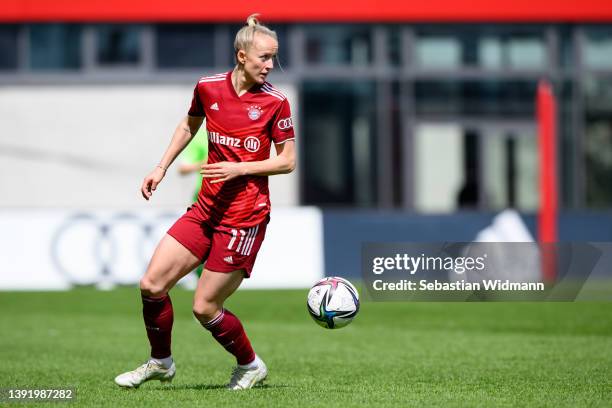 Lea Schüller of FC Bayern München plays the ball during the Women's DFB Cup semi final match between Bayern München and VfL Wolfsburg at FC Bayern...