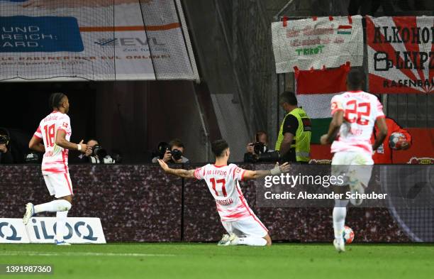 Dominik Szoboszlai of RB Leipzig celebrates after scoring his sides 1st goal during the Bundesliga match between Bayer 04 Leverkusen and RB Leipzig...