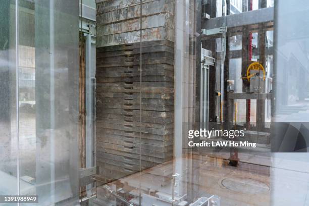 elevator structure inside glass window - lift shaft stock pictures, royalty-free photos & images