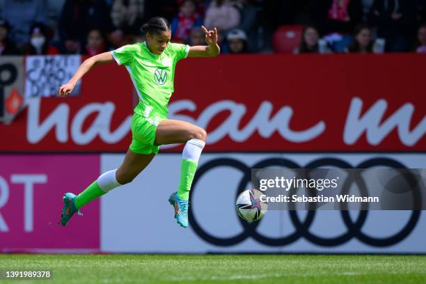 Sveindis Jane Jonsdottir of VfL Wolfsburg plays the ball during the Women's DFB Cup semi final match between Bayern München and VfL Wolfsburg at FC...