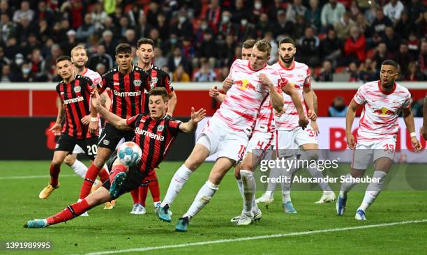 Patrik Schick of Bayer 04 Leverkusen shoots during the Bundesliga match between Bayer 04 Leverkusen and RB Leipzig at BayArena on April 17, 2022 in...